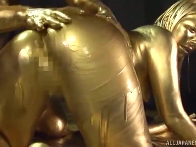 Ai Uehara is a sex slave covered in golden paint before a fuck