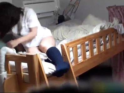 Naughty Japanese Teen Gets Caught Masturbating to Porn on Hidden Cam