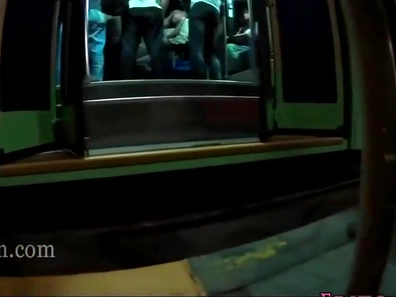 Busty Babe Gives Hot Handjob to Stranger Amidst Crowded Bus Ride Chaos