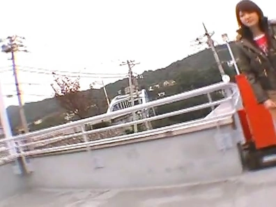 Erika Satoh Lovely Asian doll gives a blow job outdoors