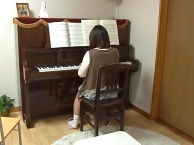 Piano teacher rear fucks his pupil across the piano keys