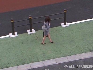 Kinky Japanese mature Kyoko Nakajima enjoys anal insertions outdoors