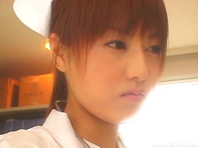 Nurse in white stockings and a garter belt fucks a patient